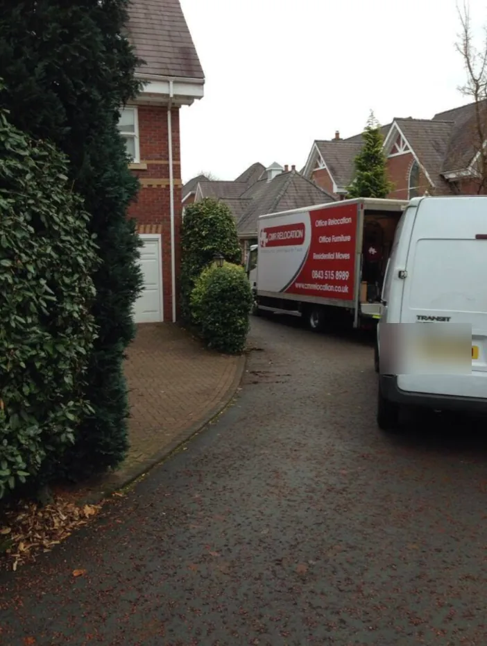 CMR Relocation removal lorry backed onto a house driveway on moving day