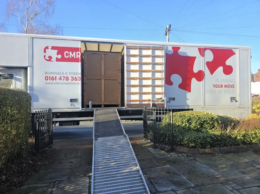 CMR Relocation removal lorry with its loading ramp out