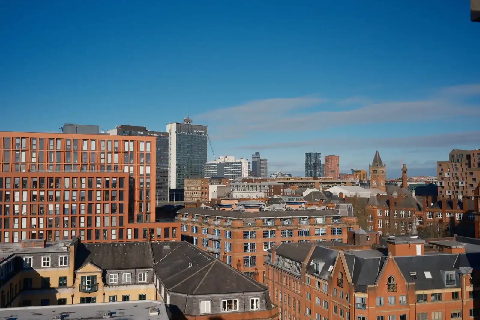 Manchester city centre skyline of red-brick buildings and office towers